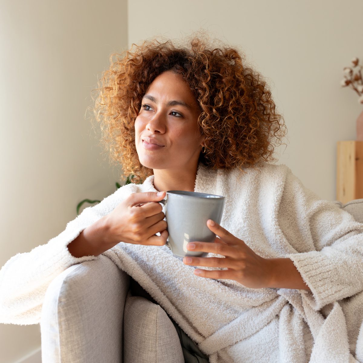 Family Law woman thinking after meeting with Fort Wayne prenuptial and postnuptial agreement lawyer