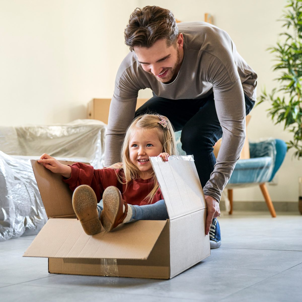Family Law happy father and daughter after getting legal assistance from a Fort Wayne relocation lawyer